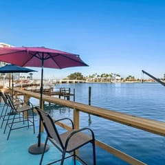 Swim, Sun & Stay | Heated Waterfront Salt Pool